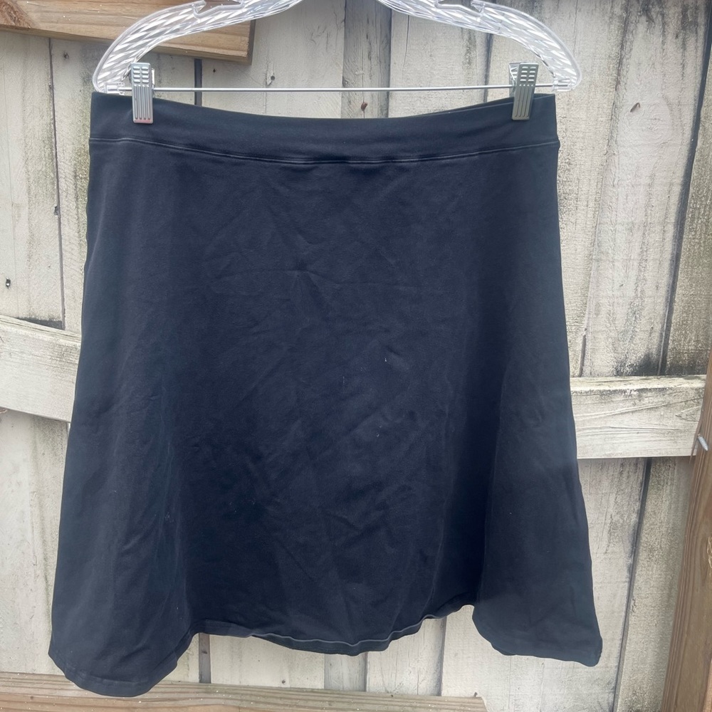 Knee length black skirt